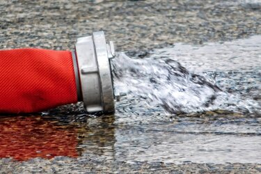 Symbolbild Feuerwehrschlauch
